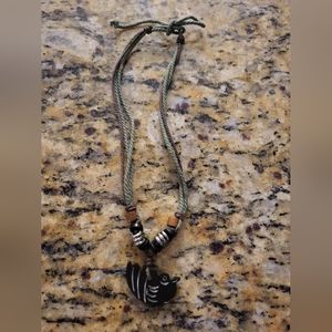 Carved animal necklace